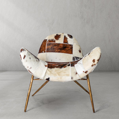 Cowhide Patchwork Wing Chair with Brass Base