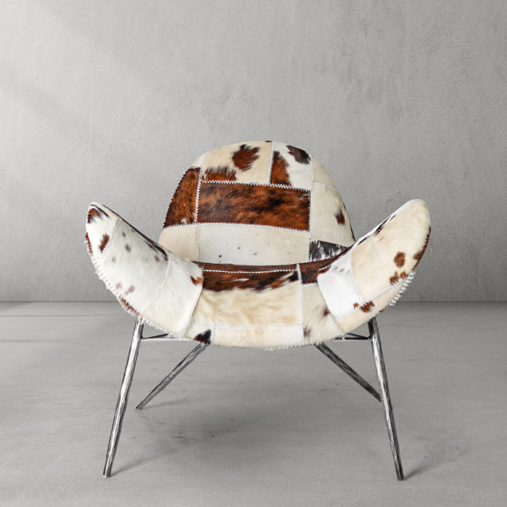 Cowhide Patchwork Wing Chair with Pewter Base
