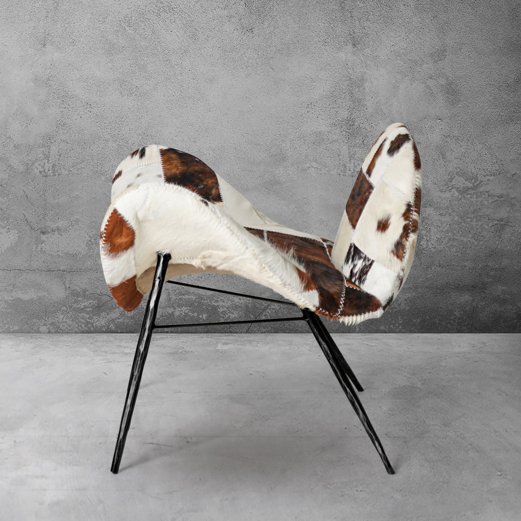 Cowhide Patchwork Wing Chair with Bronze Base