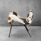 Cowhide Patchwork Wing Chair with Bronze Base