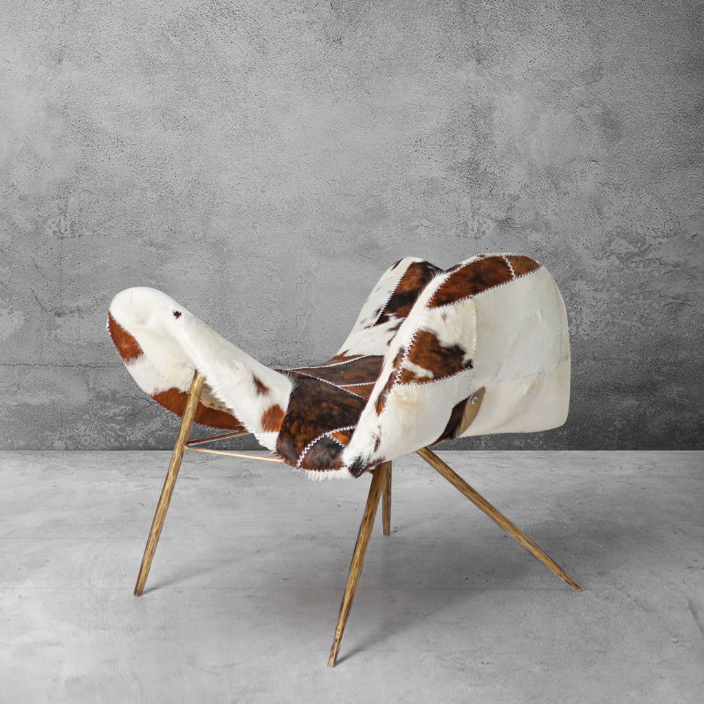 Cowhide Patchwork Wing Chair with Brass Base
