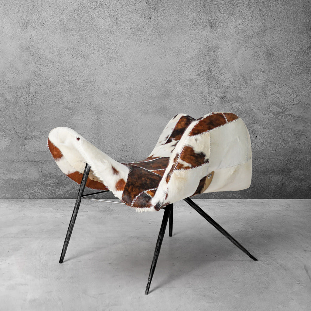Cowhide Patchwork Wing Chair with Bronze Base