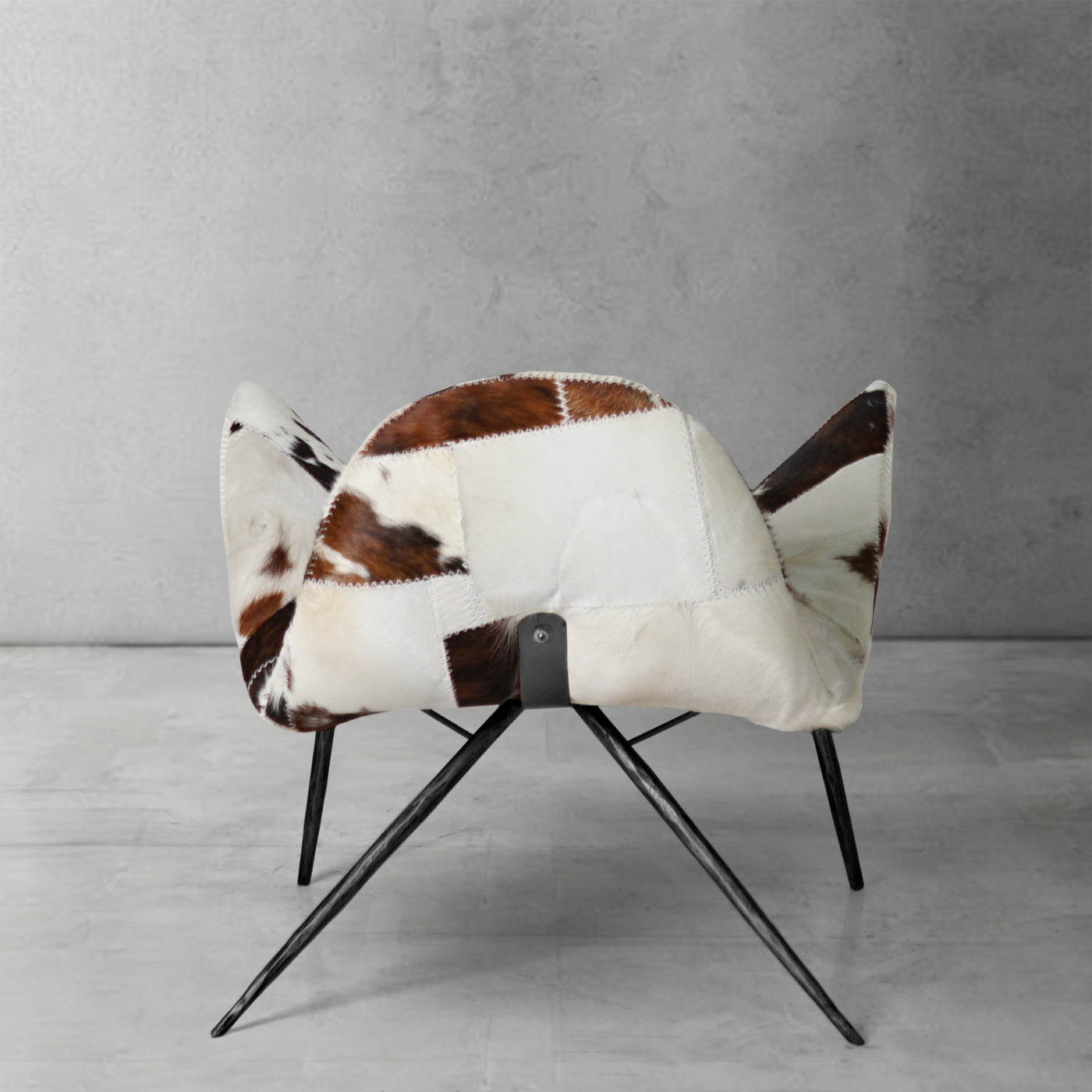 Cowhide Patchwork Wing Chair with Bronze Base